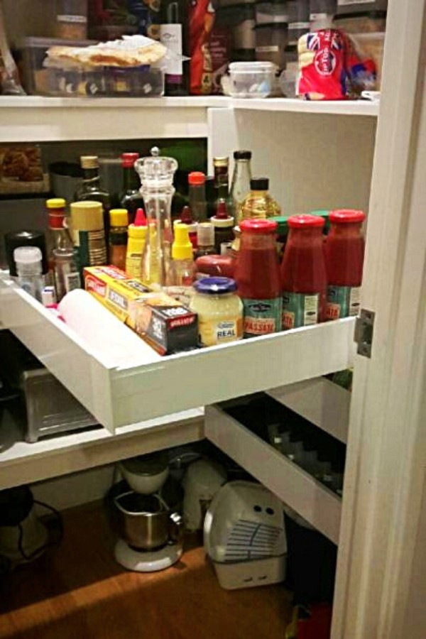 Tall single door Pantry with 3 corner pantry Drawers installed by Easy Access Kitchens