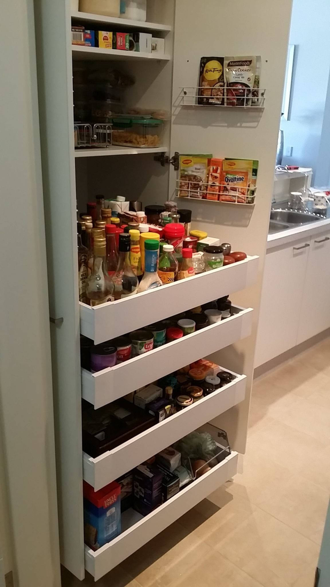 Tall double door pantry with 4 Blum 65kg rated Pantry Drawer supplied and installed by Easy Access Kitchens